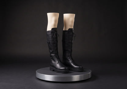 Velmurax women's lace-up knee-high boots in black, on a display mannequin on the studio turntable