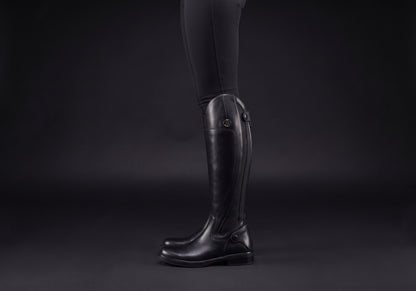 Velmurax women's long riding boots in black, worn, in side profile