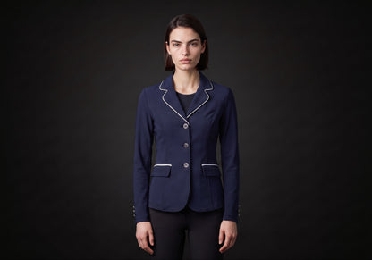 Velmurax women's show jacket in navy, worn by the model in a front view on the dark studio set