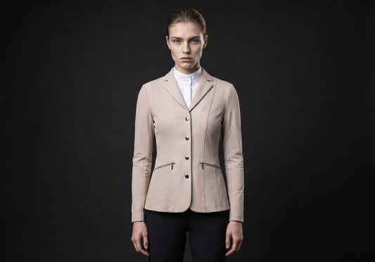 Velmurax women's show jacket in beige, worn by the model in a front view on the dark studio set