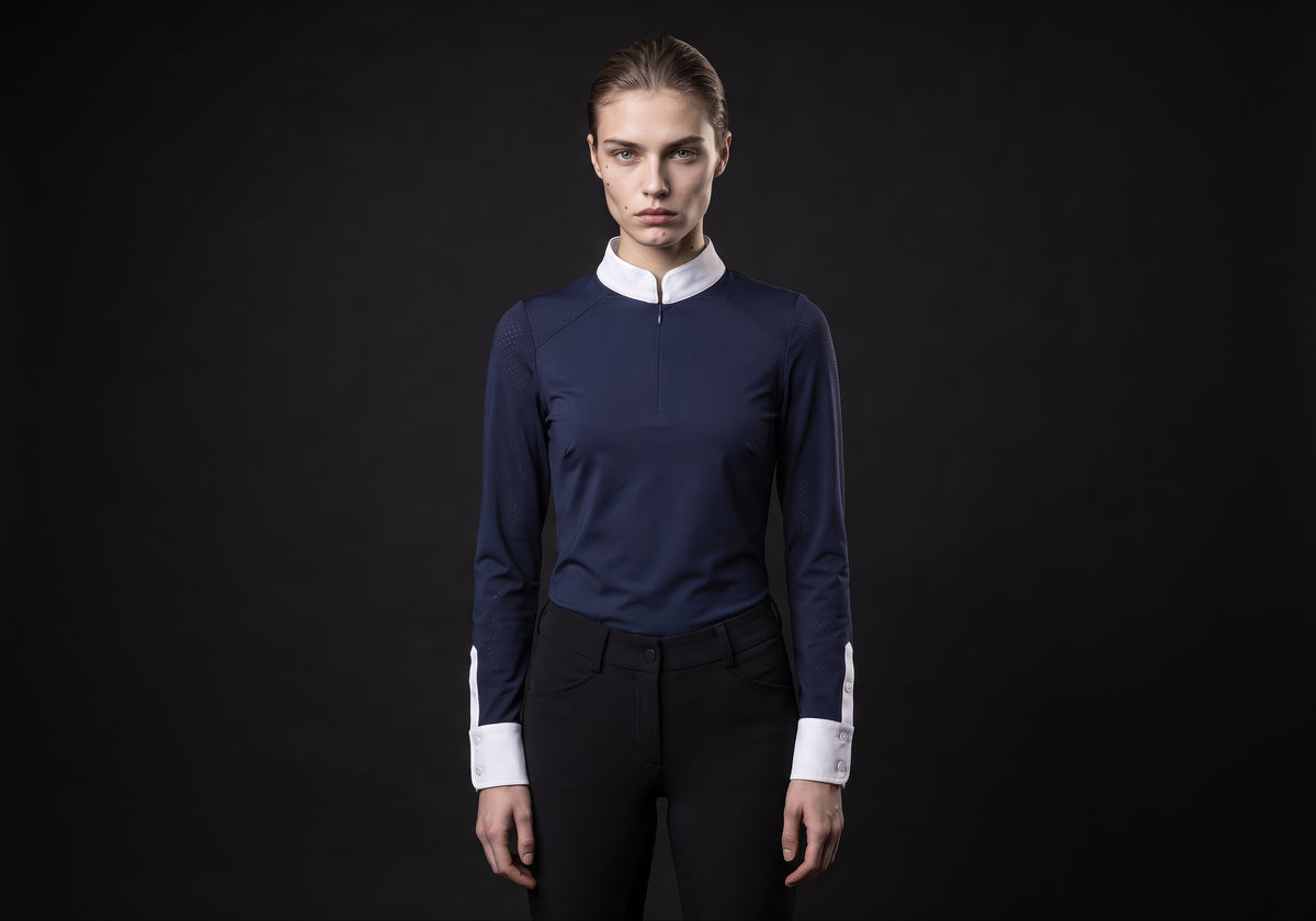 Velmurax women's show shirt in navy, worn by the model in a front view on the dark studio set