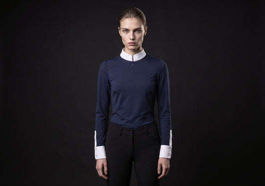 Velmurax women's show shirt in navy, worn by the model in a front view on the dark studio set