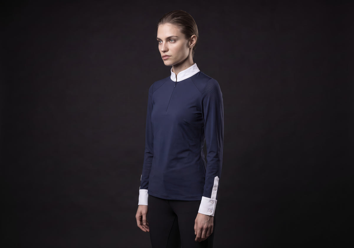 Velmurax women's show shirt in navy, in a three-quarter view on the model on the studio set