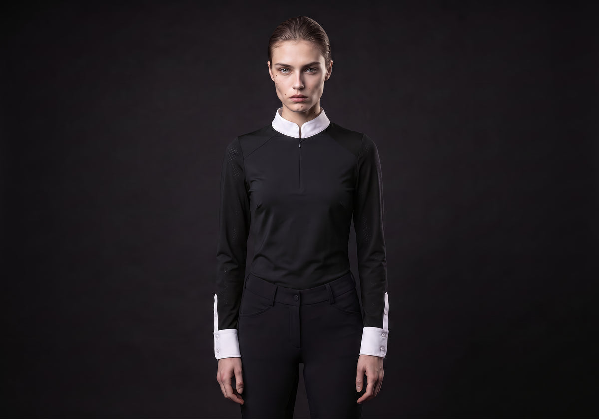 Velmurax women's show shirt in black, worn by the model in a front view on the dark studio set