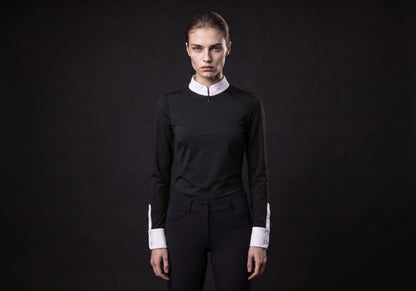 Velmurax women's show shirt in black, worn by the model in a front view on the dark studio set
