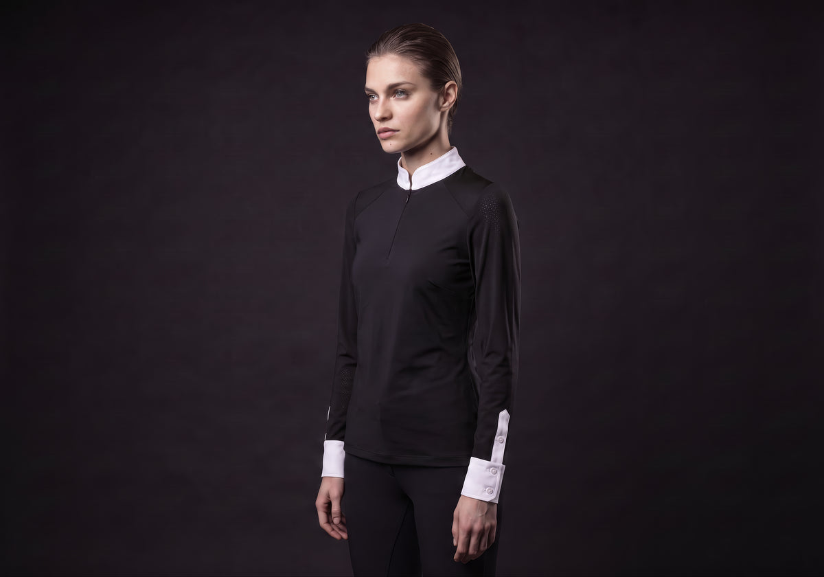 Velmurax women's show shirt in black, in a three-quarter view on the model on the studio set