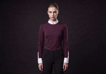 Velmurax women's show shirt in burgundy, worn by the model in a front view on the dark studio set