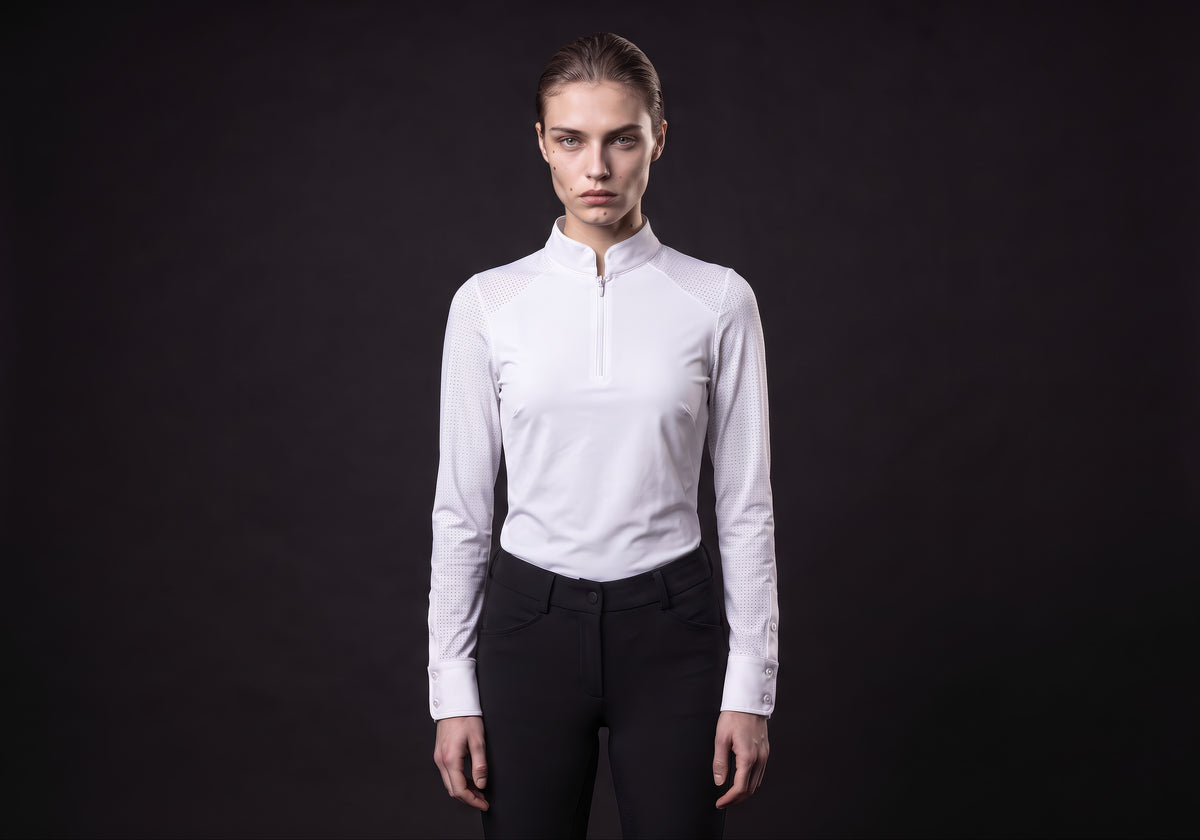 Velmurax women's show shirt in white, worn by the model in a front view on the dark studio set