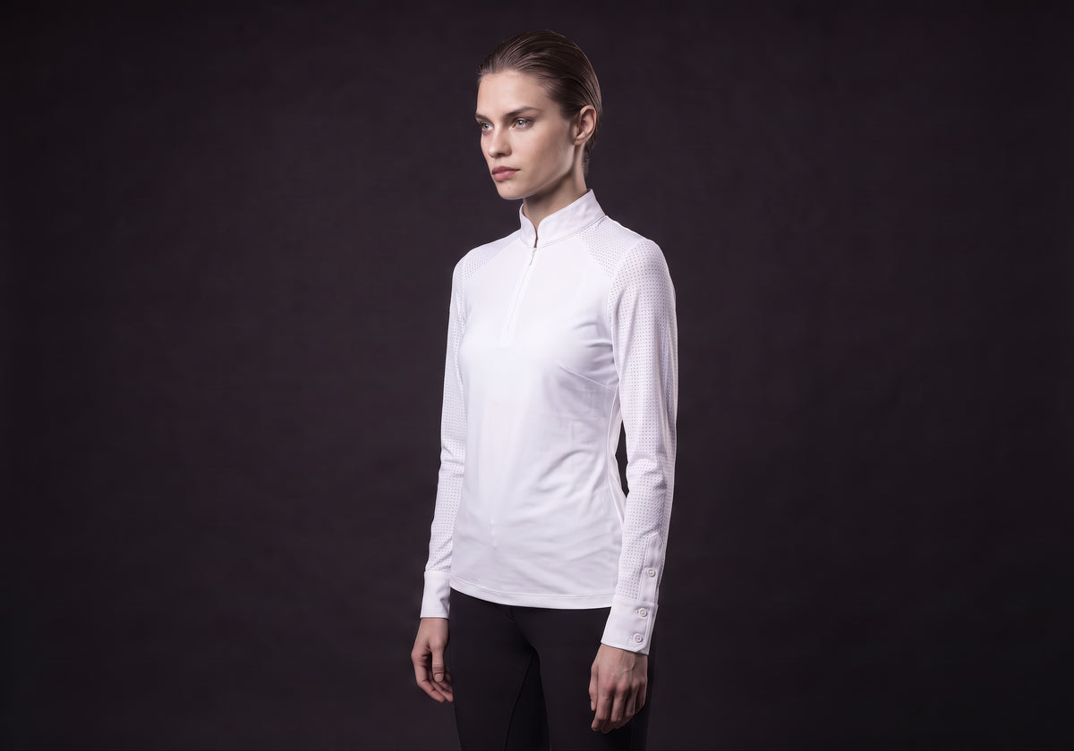 Velmurax women's show shirt in white, in a three-quarter view on the model on the studio set