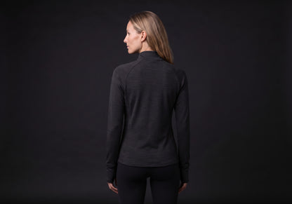 Velmurax women's stretch track jacket in black, seen from the back on the model, showing the back of the garment