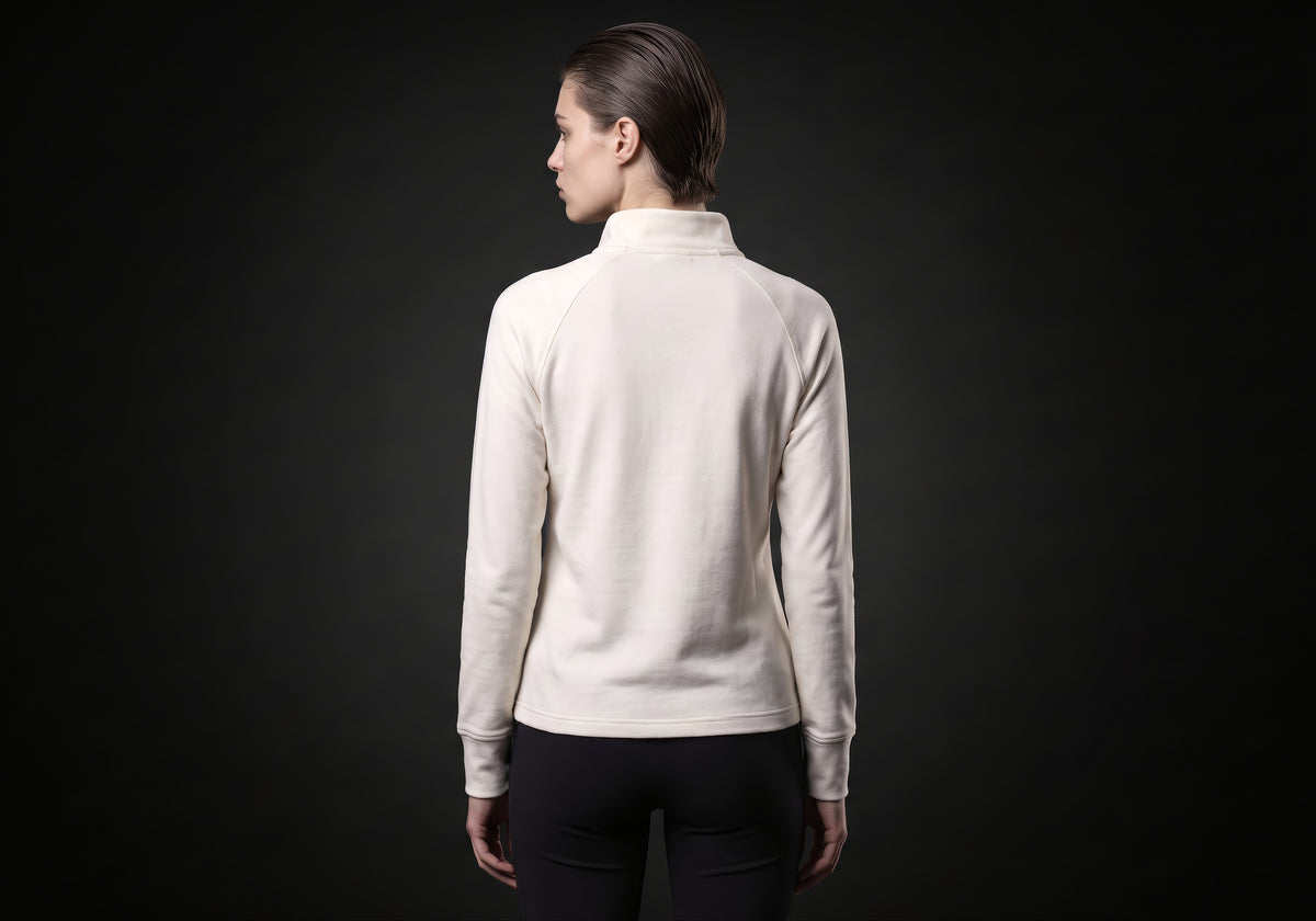 Velmurax women's thermal riding shirt in ivory, seen from the back on the model, showing the back of the garment