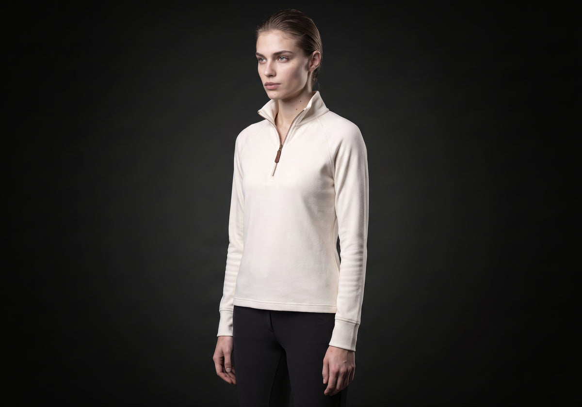Velmurax women's thermal riding shirt in ivory, in a three-quarter view on the model on the studio set