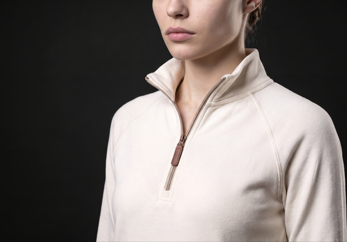 Velmurax women's thermal riding shirt in ivory, in a close detail shot on the model
