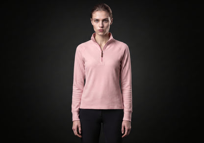 Velmurax women's thermal riding shirt in pink, worn by the model in a front view on the dark studio set