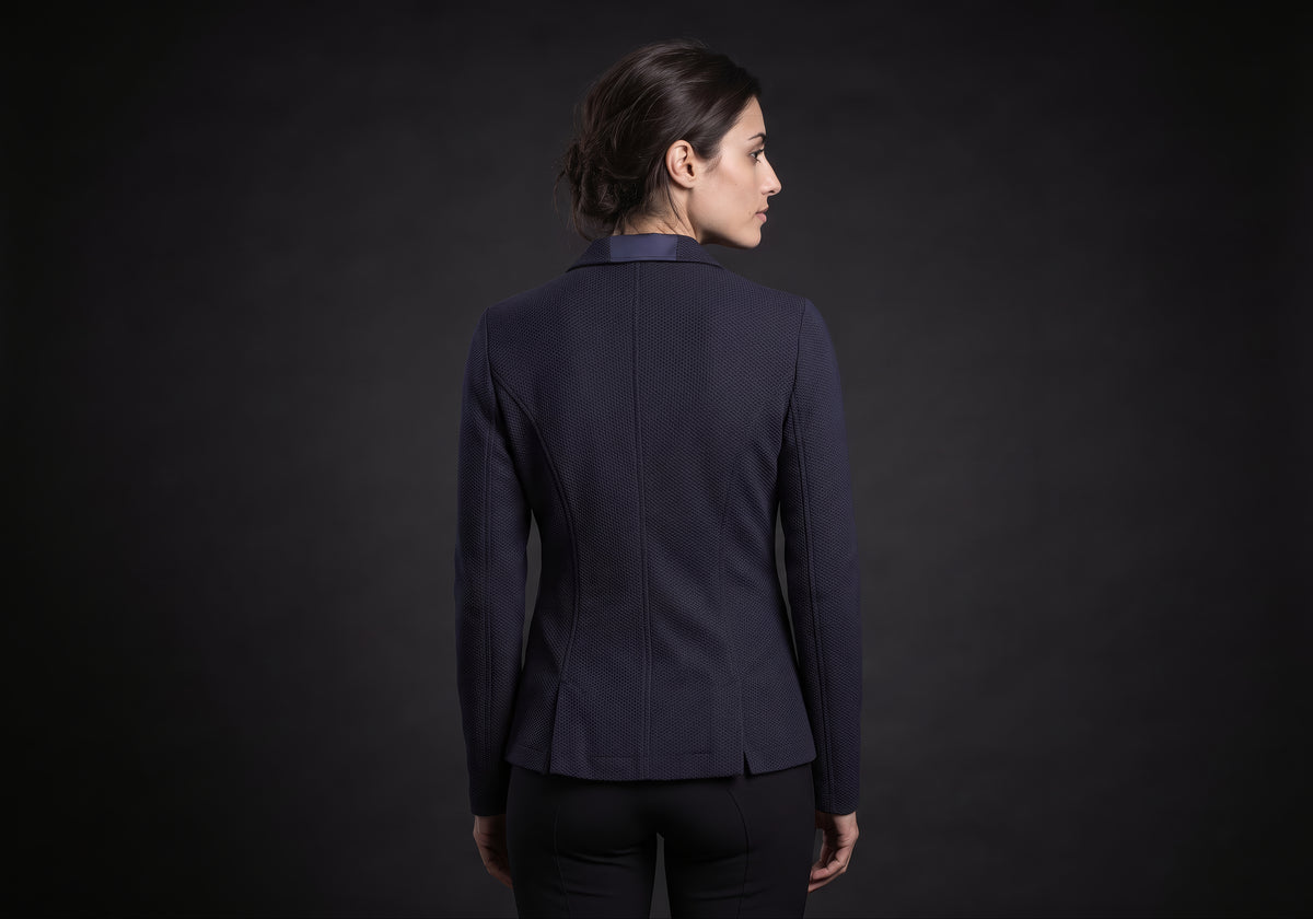 Velmurax women's show jacket in navy, seen from the back on the model, showing the back of the garment