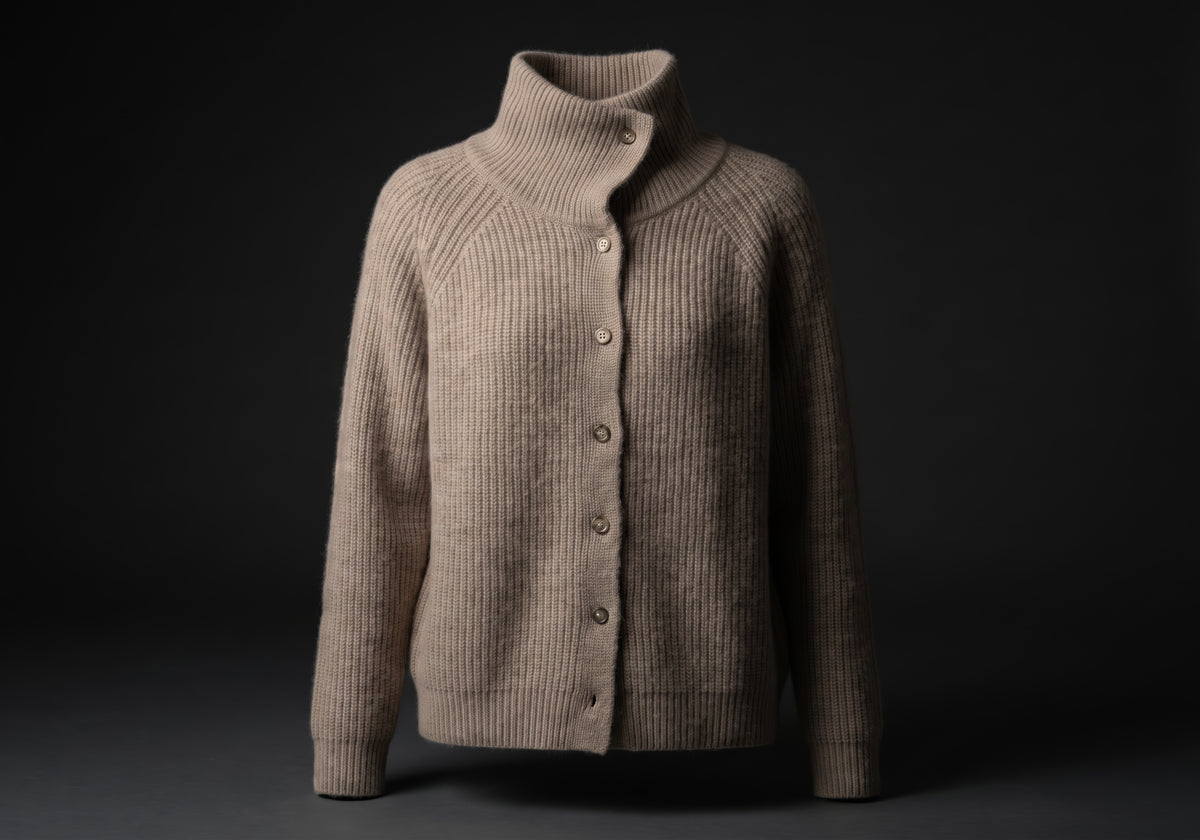 Velmurax wool turtleneck cardigan in taupe on its own, showing the horn-look buttons down the full placket
